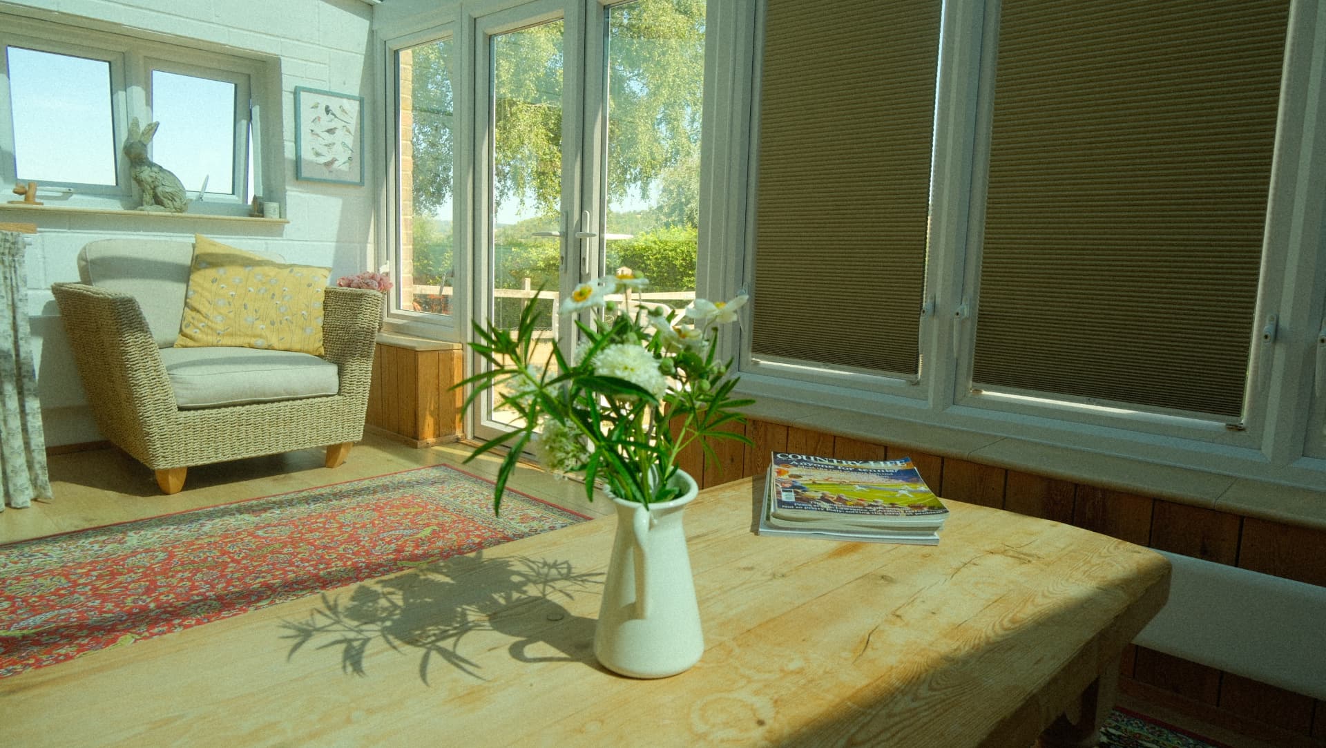 French doors opening from the garden room to the terrace