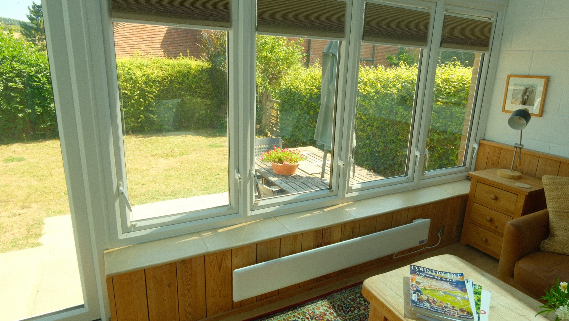 Windows onto the terrace and lawn